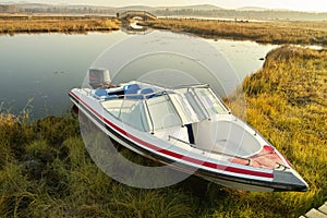 Speed boat at lake side