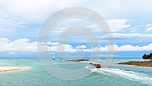 Speed boat is leaving the coast of Tarutao island