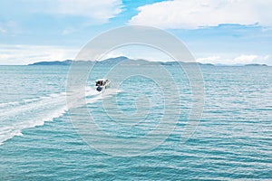 A speed boat sailed in the sea in the Gulf of Thailand heading for Koh Larn island