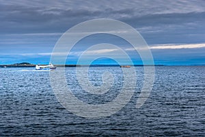 Speed boat taking tourists to Mackinac Island in the Upper Peninsula Michigan