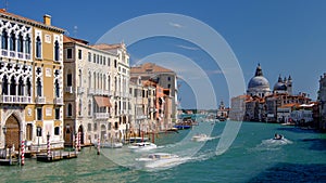 Speed boats on the busy Grand Canal in Venice, Italy
