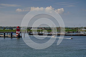 Speed boats on the sea, getting out from the port Wyk auf FÃ¶hr.