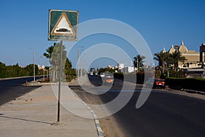 Speed bump road sign on highway