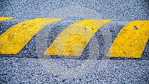 Speed bumps in a Road are the common name for a family of traffic calming devices that use vertical deflection to slow motor