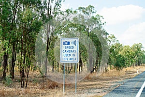 Speed Camera In Use Warning Sign On Highway