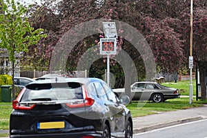 Speed camera warning driver of speeding in residential 30mph limit area