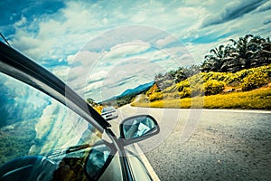 Speed car driving at high speed on empty road