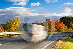 Speed car on a road in Krkonose mountain