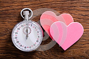 Speed Dating Concept. Hearts And A Stop Watch