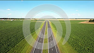 Speed Intercity Highway Through Agricultural Field With Moving Cars Aerial View