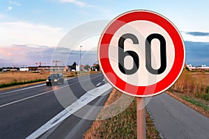 Speed limit at 60 kmph traffic sign by the road