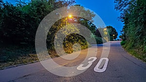 Speed limit 30 km hour. Mark on the road