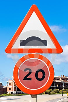 Speed limit and road hump sign