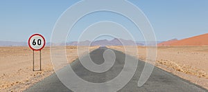 Speed limit sign at a desert road in Namibia