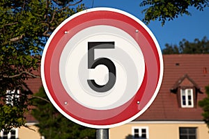 Speed limit sign five