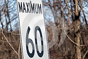 Speed limit sign says maximum 60