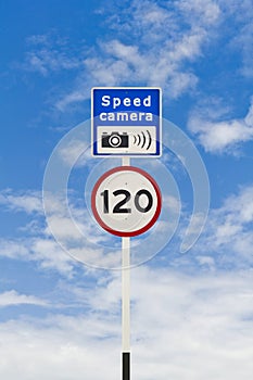 Speed limit and speed camera signpost