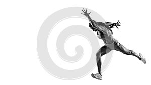 Speed and power. Black and white portrait of professional female athlete, runner, jogger in action isolated on white