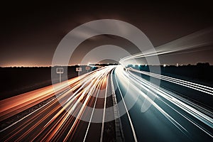 Speed Traffic - light trails on motorway highway at night