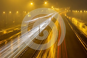 Speed Traffic - light trails on motorway highway at night