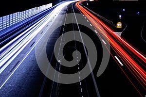 Speed Traffic - light trails on motorway highway at night, long