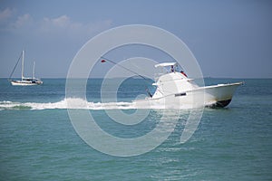 Speed yachts near tropical island in Key West