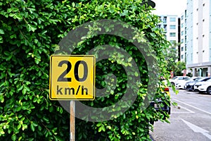 Speed â€‹â€‹limit sign with green leaf