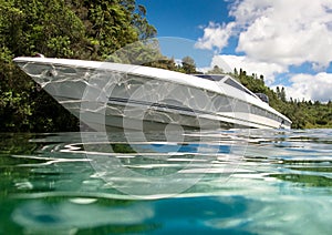 Speedboat on calm lake photo