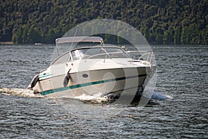 Speedboat cruising on Lake Iseo, Lombardy, Italy