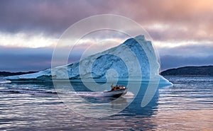 Speedboat and Icebergs in Disko Bay Greenland