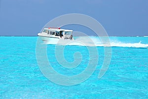Speedboat in the Maldives sea photo
