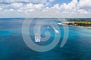 Speedboats in caribbean sea shot from drone photo