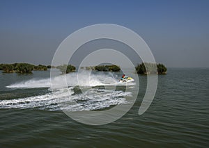 Speedboats, motorboats in the lake photo