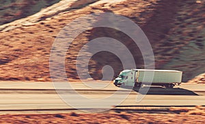 Speeding American Semi Truck on the Utahs Interstate High 70