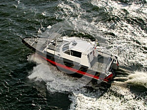 Speeding boat over the sea