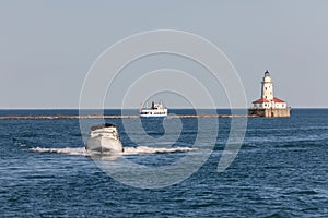 Speeding Boats around Chicago Lighthouse