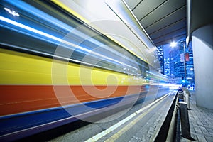 Speeding bus, blurred motion.