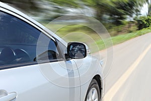 Speeding car with motion blur