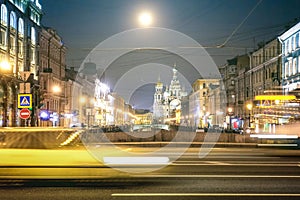 Speeding car on the street with front view of Canal Griboedova w