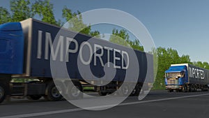 Speeding freight semi truck with IMPORTED caption on the trailer. Road cargo transportation. 3D rendering