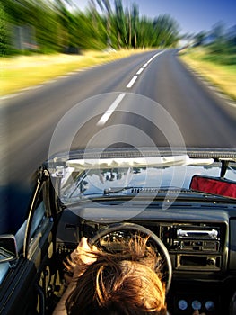 Speeding in Golf cabrio photo