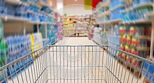 Speeding mall aisle with shopping cart