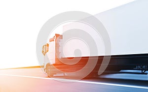 Speeding Motion of Semi Truck Driving on the Road. Industry Cargo Freight Truck. Logistics and Cargo Transport Concept