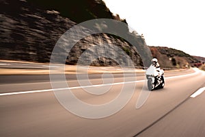 Speeding Motorcycle Woman