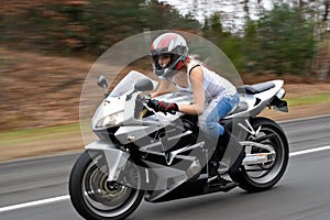 Speeding Motorcycle Woman