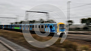 Speeding Passenger Train moving through Station in Sydney CBD NSW Australia