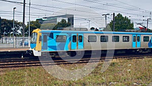 Speeding Passenger Train moving through Station in Sydney CBD NSW Australia