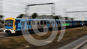 Speeding Passenger Train moving through Station in Sydney CBD NSW Australia