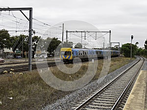 Speeding Passenger Train moving through Station in Sydney CBD NSW Australia