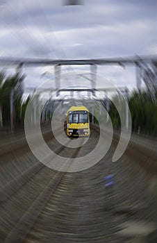 Speeding Passenger Train moving through Station in Sydney CBD NSW Australia